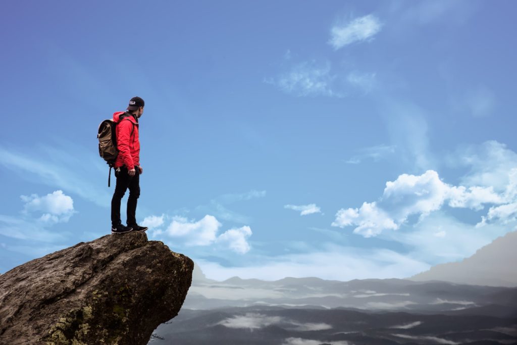 a man standing on a rock