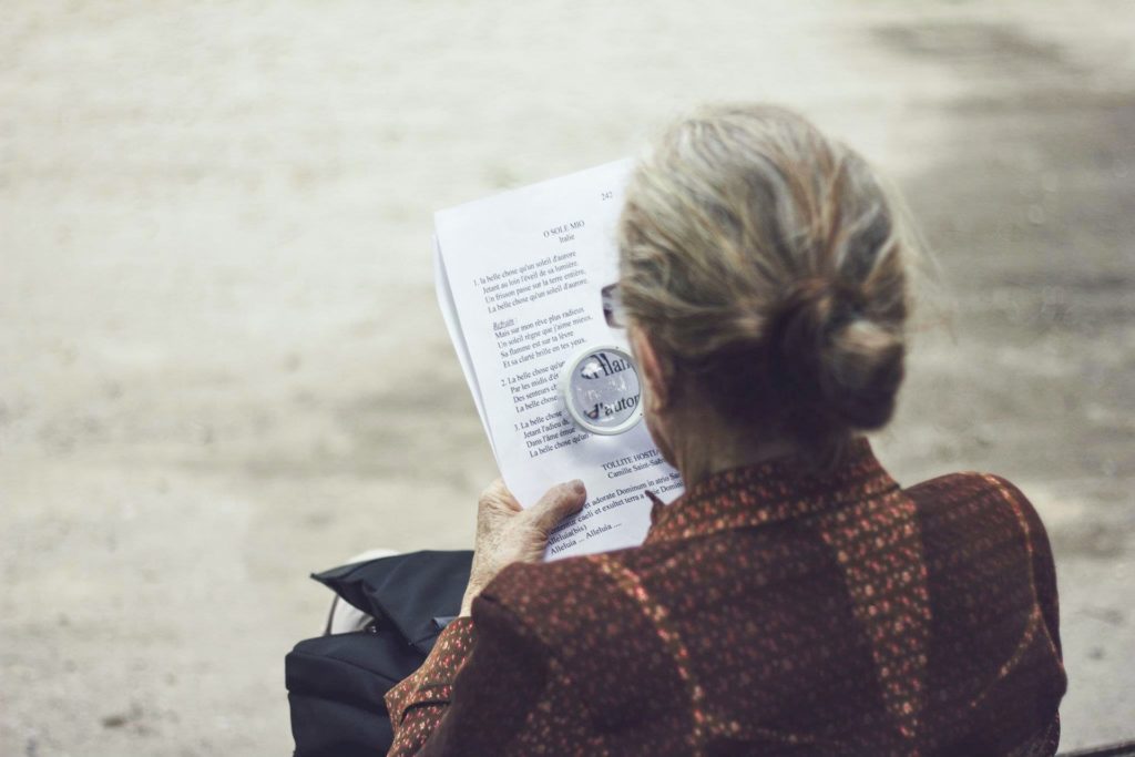 a person reading a newspaper