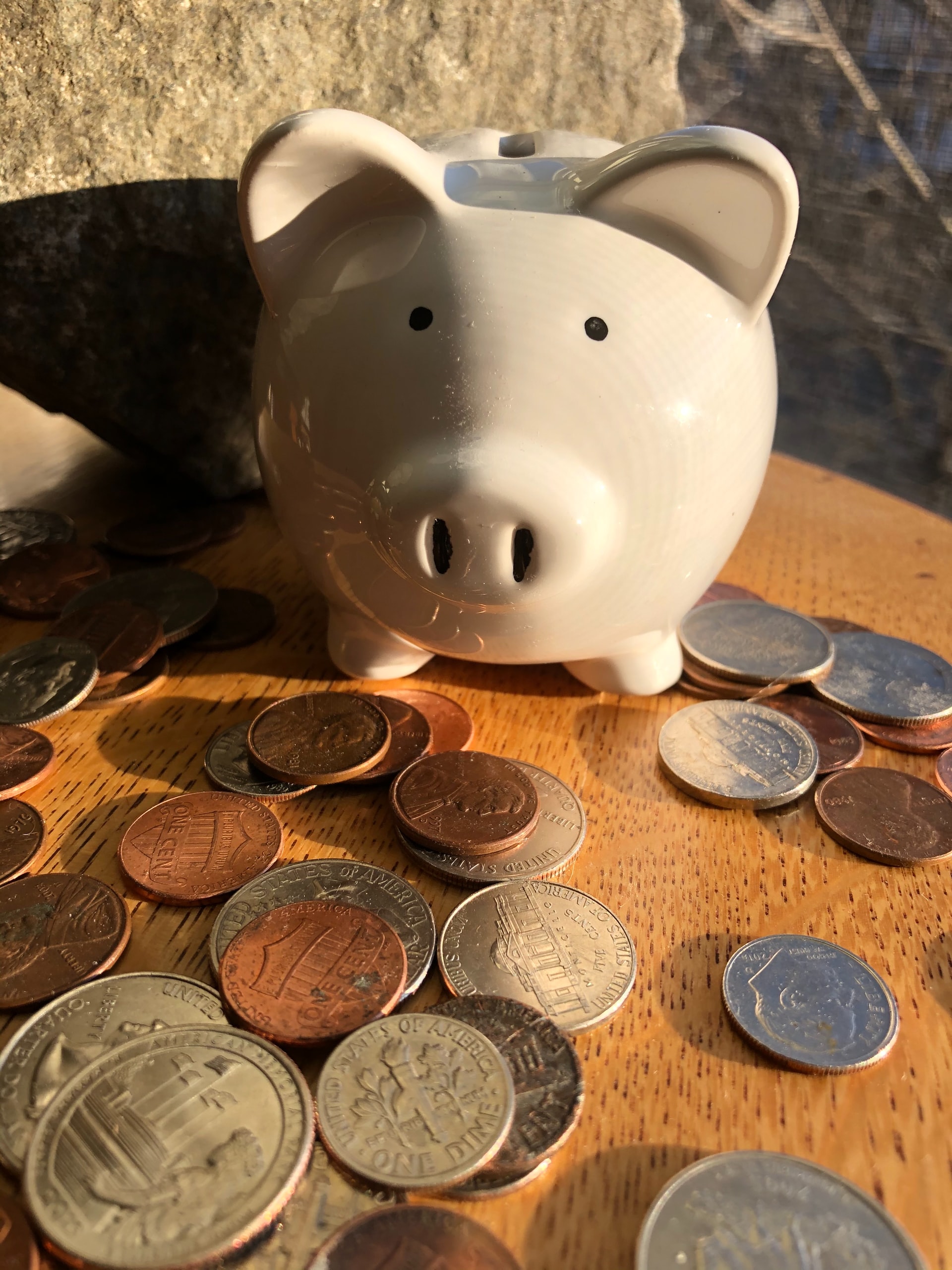 a piggy bank with coins on it