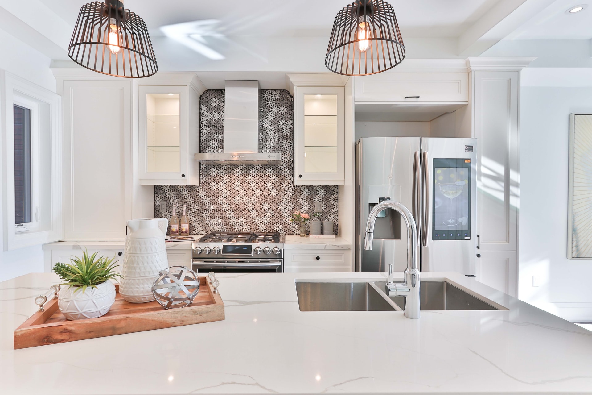 a kitchen with white cabinets