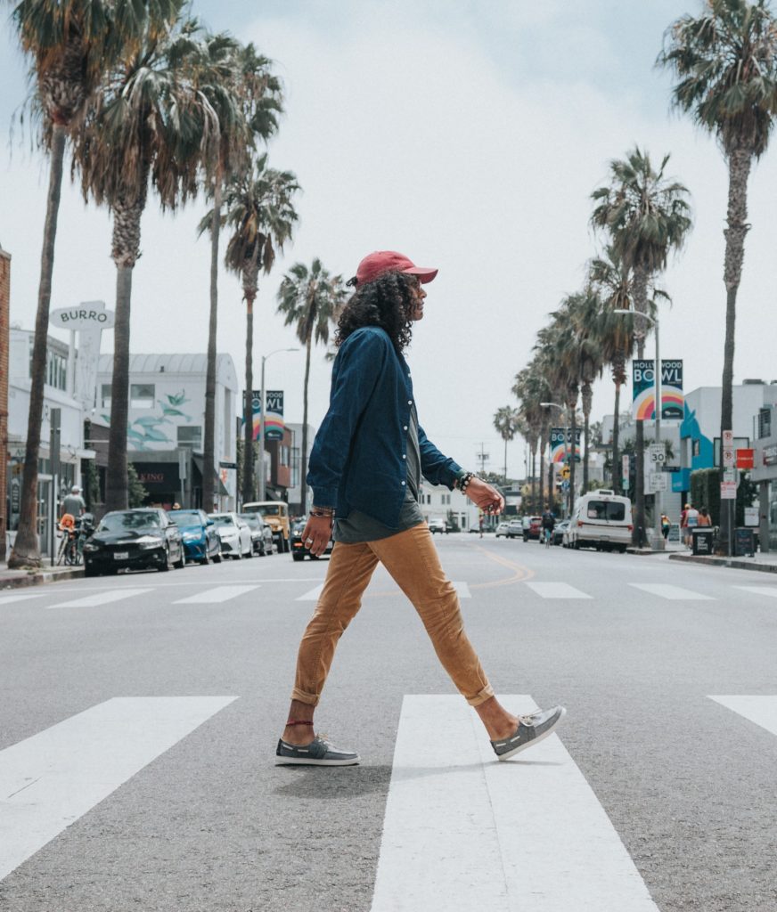 a man crossing a street