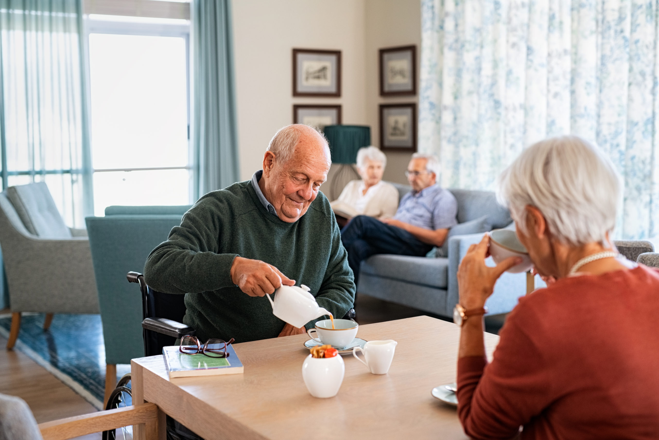 a group of people sitting around a table