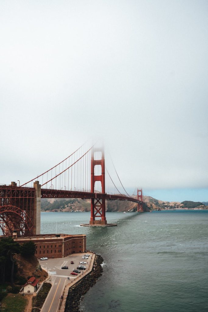 a red bridge over water